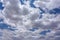 Cumulus Blue Sky White Clouds Dark with Rain Background