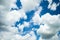 Cumulus And Cirrus Clouds On Blue Sky In Spring Close Up