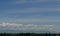 Cumulus cirrus clouds hawk in flight hazy day Idaho