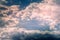 Cumulus, cirrus and lenticular clouds