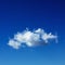 Cumulus cloud in blue sky.