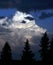 A cumulus cloud of a passing thunderstorm lit by the sun. Spring in the Western Urals.