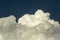 Cumulus clouds at the background of blue sky