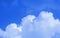 Cumulus clouds beautiful blue sky puffy cotton-like fog smoke background wallpaper/.