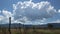 Cumulus Clouds over Rural Scene Zoom Out Timelapse