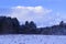 Cumulus clouds over the Ural winter forest