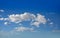 Cumulus clouds perfect white in blue sky