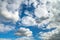 Cumulus clouds, Stratocumulus against a blue sky