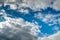 Cumulus clouds, Stratocumulus against a blue sky