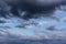 Cumulus epic scenic storm clouds in the blue sky background texture