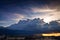 Cumulus nimbus cloud and raining over the city