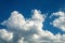 Cumulus, Stratocumulus, fluffy clouds against a blue sky