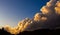 Cumulus and Stratus clouds in dramatic sunset sky