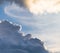 Cumulus sunset clouds with sun setting down, beautiful sky