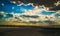 Cumulus thunderclouds over the Kuyalnik Estuary in the evening before sunset