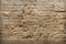 Cuneiform or hieroglyphs of Ancient civilization carved on old stone wall. Undeciphered signs like Sumerian, Babylonian and