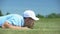 Cunning male golf player blowing ball in hole at course, successful shot, fun