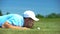 Cunning male golf player blowing ball in hole at course, successful shot, fun