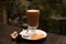 Cup of aromatic cacao on table