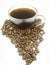 Cup of black coffee among beans africa shape