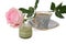 Cup of black coffee, pistachio honey-souffle and beautiful pink rose on white background. Gift for beloved woman