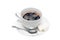 Cup of black coffee on a saucer with a napkin, a teaspoon and lumps of sugar