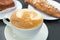 Cup of Caffe Latte with Pastry