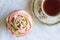 Cup cake and cup of tea - Top view photograph