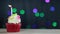 Cup cake and happy birthday text on Screen background. Birthday cupcake with a single blue candle. Cupcake with yellow cream and f