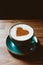 Cup of cappuccino coffee decorated cinnamon heart symbol