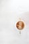 Cup with cappuccino coffee on a light white retro sloppy fabric background. Copy space. Flat lay, top view. Minimalism