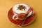 A cup of cappuccino with decoration