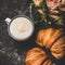 Cup of cappuccino, fresh croissants and pink flowers, square crop