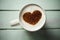 Cup of cappuccino with a heart