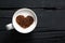 Cup of cappuccino with a heart