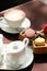 Cup of cappuccino and macaroons