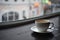 Cup of cappuccino, rain fall