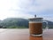 A cup of cappucino with beautiful scenery