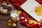 Cup of cocoa with marshmallow, chocolate cookie and peanut biscuit, blanket. Fall scene. Autumn relaxation, country lifestyle, rel