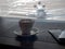 Cup of coffee in airport`s business lounge with aircraft