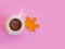 Cup of coffee autumn banner morning minimalism pattern leaves on a colored background