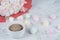 A cup of coffee on the background of sweets Marshmallows, close-up.Holiday concept, congratulations