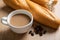 Cup of coffee and baguette french bread