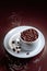 Cup with coffee beans on a brown background