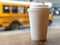 Cup of coffee blank yellow school bus usa