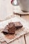 Cup coffee with chocolat on wooden table and black background