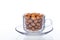 Cup of coffee-flavored peanut on white isolated background with