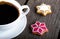 Cup Of Coffee with Gingerbread cookies on wooden background