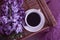 Cup of coffee, lilac natural espresso in the apartment romantic floral