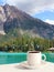 Cup of coffee in the morning in an Emerald lake